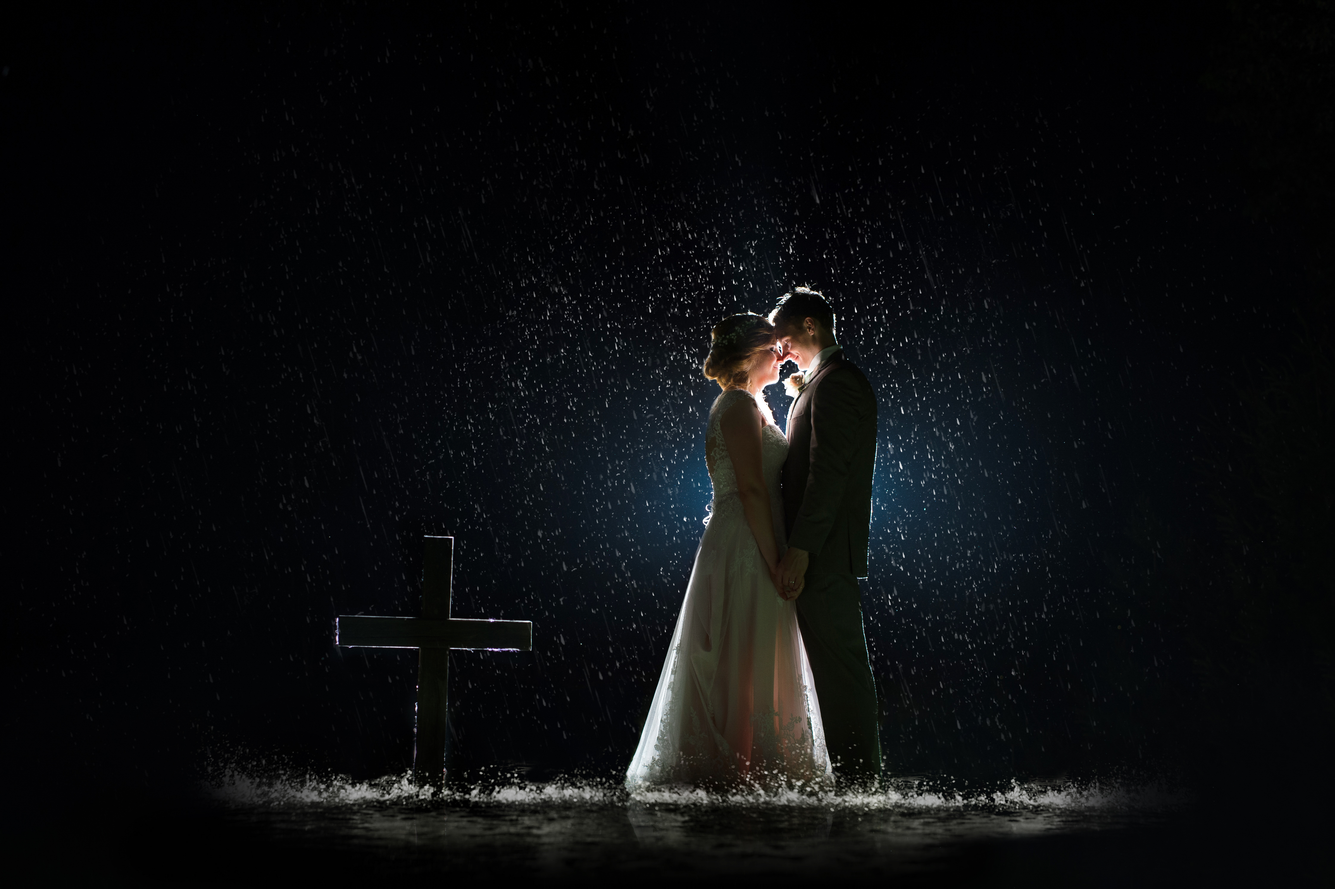 bride and groom outside in dark
