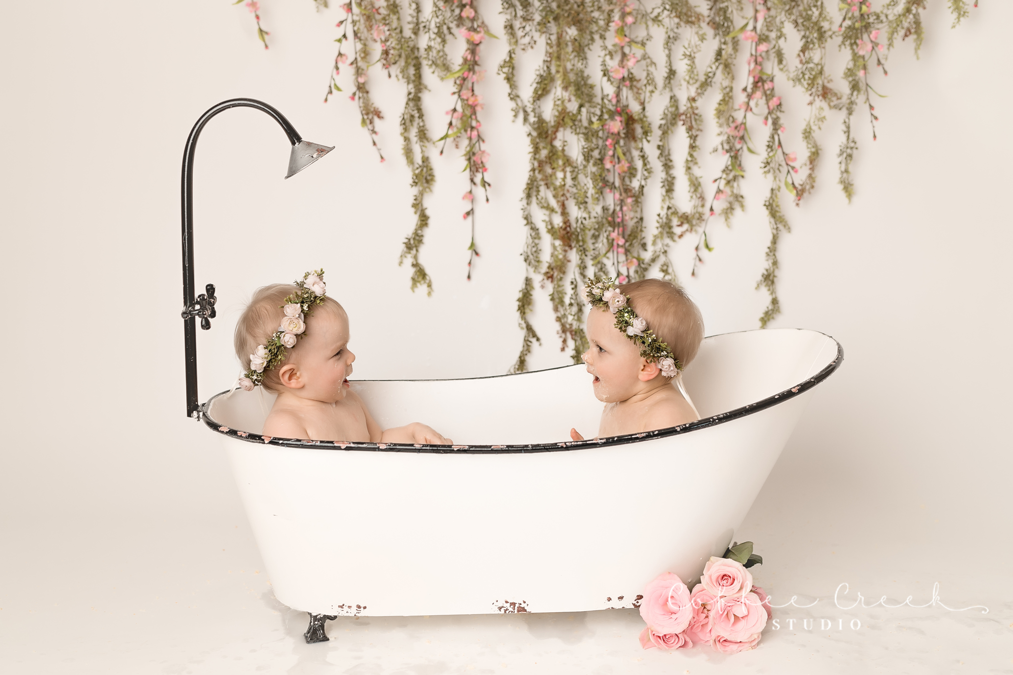 twin girls in vintage tub