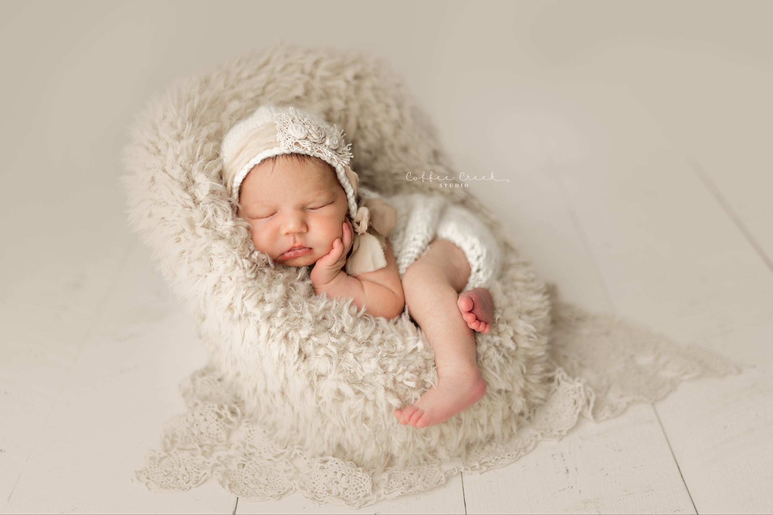 newborn baby girl posed